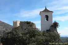 Guadalest Bell Tower and Alcozaiba Castle in the background